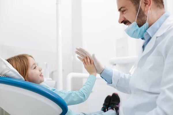 How a Denver Pediatric Dentist Helps Prevent Cavities in Kids